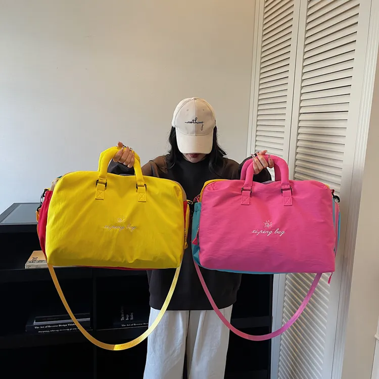 撞色户外旅行包行李袋彩色运动健身手提斜挎单肩多巴胺多功能韩式