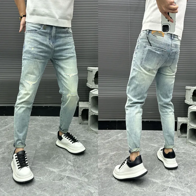 轻奢百搭破洞浅蓝色男士牛仔裤补丁小脚弹力显瘦休闲时尚春夏季潮