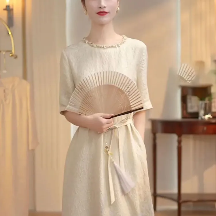 夏季新款圆领时尚轻熟女人味连衣裙时尚系带收腰设计显瘦中长裙潮