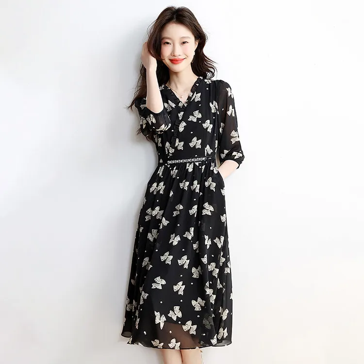 夏季新款收腰显瘦气质V领七分袖碎花印花中长款大摆连衣裙