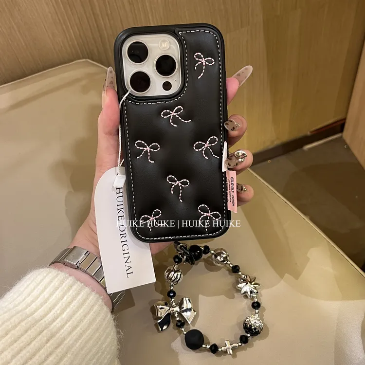 高级黑色皮革刺绣蝴蝶结适用苹果17手机壳iphone16/15/14promax女