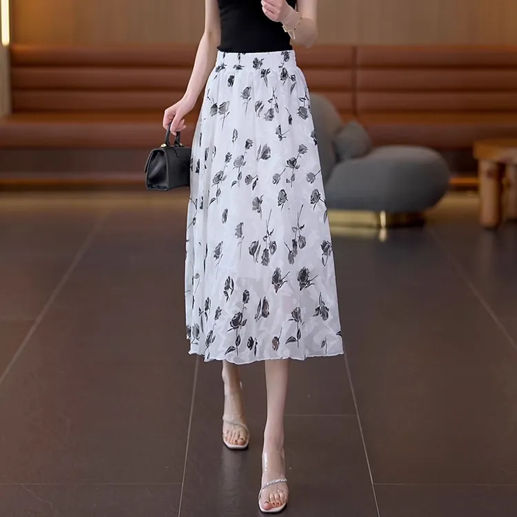 拉夏贝尔印花半身裙女2025新款夏季薄中长款高腰蝴蝶百搭A字伞裙