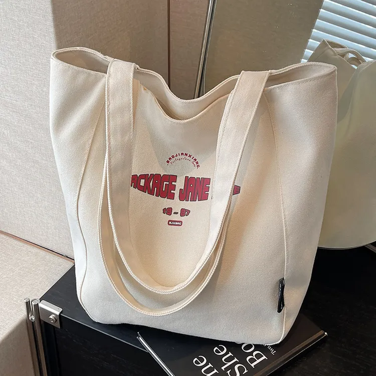 大容量帆布包包女2025新款布包时尚简约单肩布袋大学生通勤托特包
