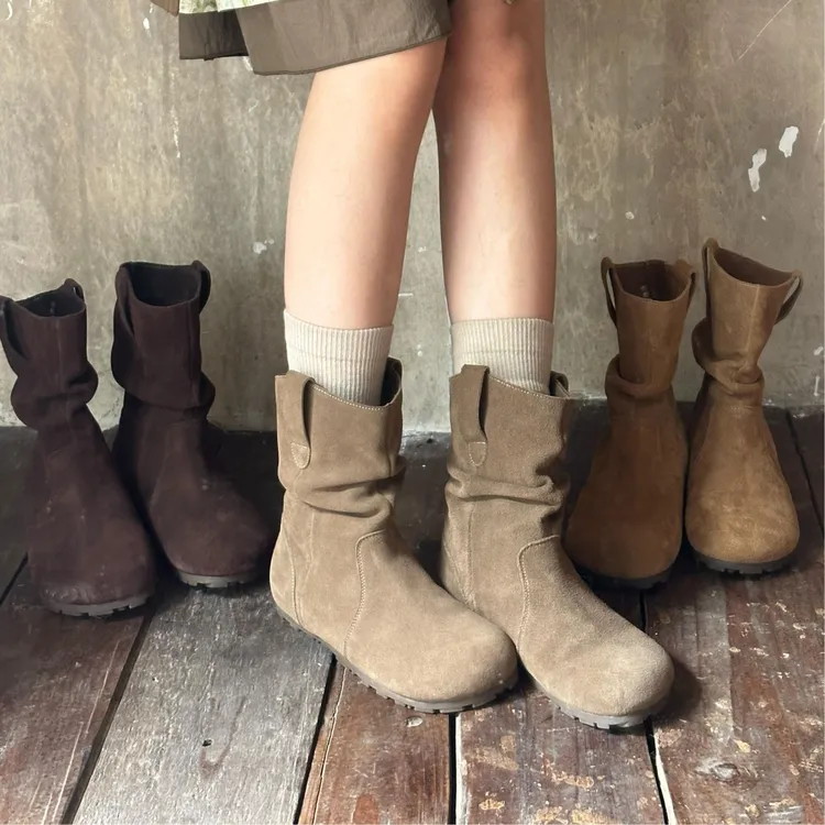 秋冬新款松果堆堆靴内增高牛皮软底保暖显瘦勃肯骑士短靴女