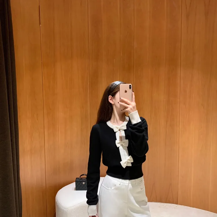 EASE Miu系小千金精致立体蝴蝶结下摆收腰软糯针织衫（含100羊毛