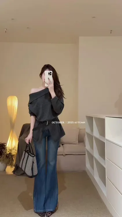 2025秋季新款韩系灰色毛衣慵懒高级感斜肩针织衫复古微喇牛仔裤