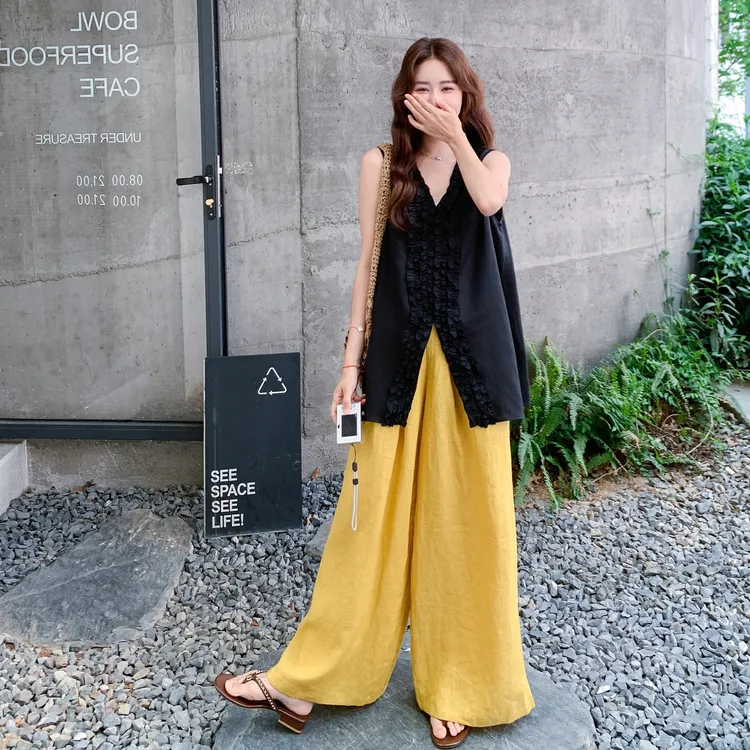 大方得体穿搭一整套2025超火黑色木耳边无袖背心高腰阔腿裤两件套