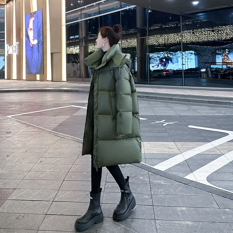 绿色羽绒服女中长款2025冬装新款韩版过膝加厚保暖极寒外套连帽潮