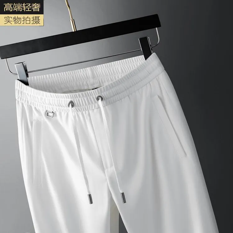 精品桑蚕丝休闲裤男夏季薄款裤子男士运动裤冰丝男裤白色直筒卫裤