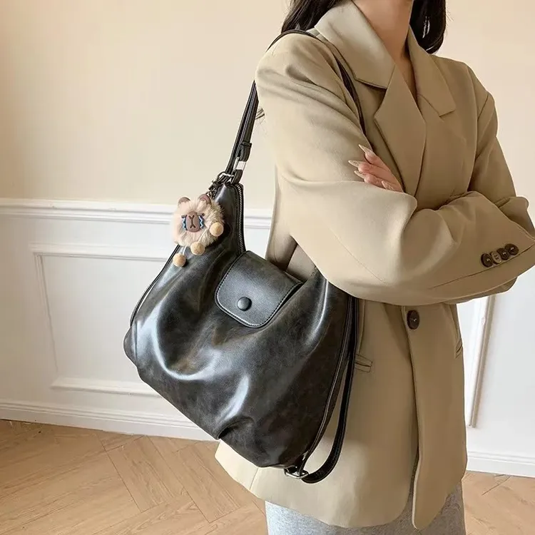 大容量多功能女单肩斜挎包通勤双肩包复古云朵包新款