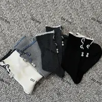 FY033秋款百搭纯色中筒珍珠袜