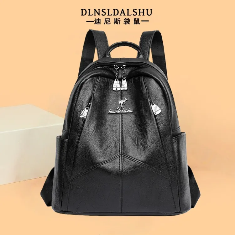 迪尼斯袋鼠真皮外出通勤款时尚轻职欧美双肩学生韩版真牛皮女包