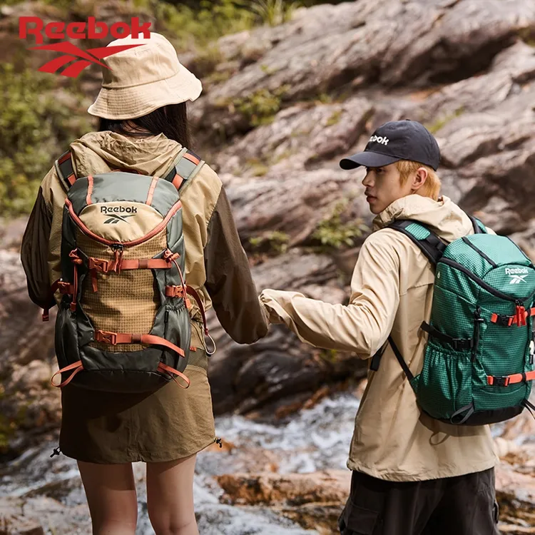 锐步轻量化户外运动登山包男大容量防水露营包徒步旅行双肩背包女