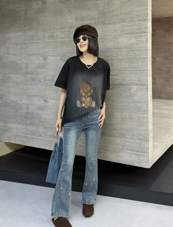 奇奇家时尚韩版大码女装2025秋季新款高腰高弹重工压钻牛仔微喇裤