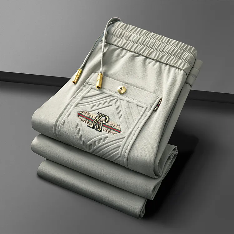 春夏锦纶冰感速干束脚九分裤修身弹力薄款裤子潮流百搭夏季男裤