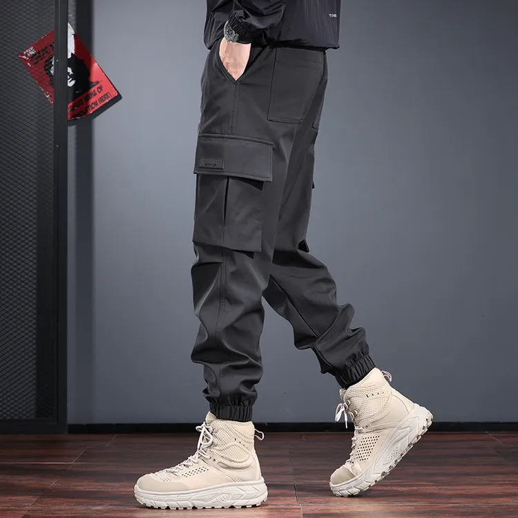 高端冲锋休闲裤男秋冬季运动户外抽绳束脚裤机能防水登山工装裤潮