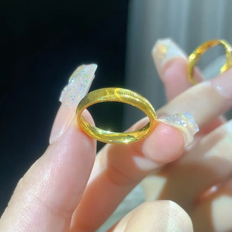 钛钢戒指 可水洗不掉色猫眼爆闪戒指女素圈波纹指环情侣对戒婚戒