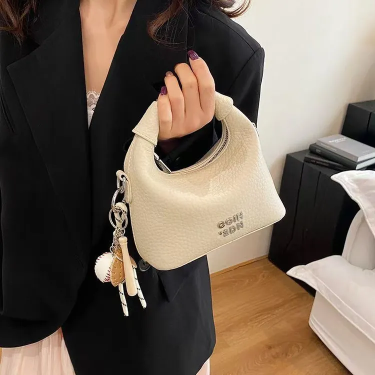 2025夏季新款爆款时尚百搭手拎饺子包复古单肩斜跨网红高级感女包商品图