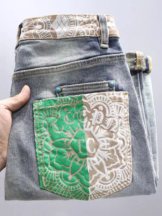 高端水洗复古牛仔裤男款印花破洞补丁修身小脚裤潮流韩版弹力长裤