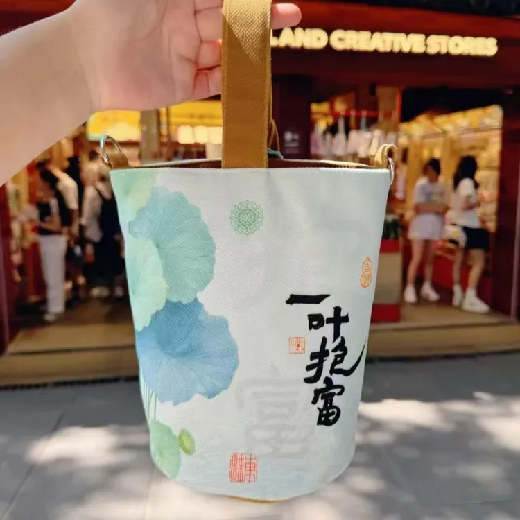 东魅夏日新款一叶抱富景区文创帆布包多功能一包四背杭州手提袋