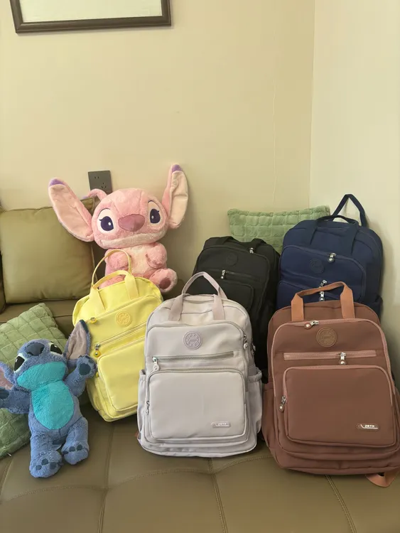 左拉新款手拎双肩轻便大容量防泼水简约时尚洋气户外出行轻奢背包