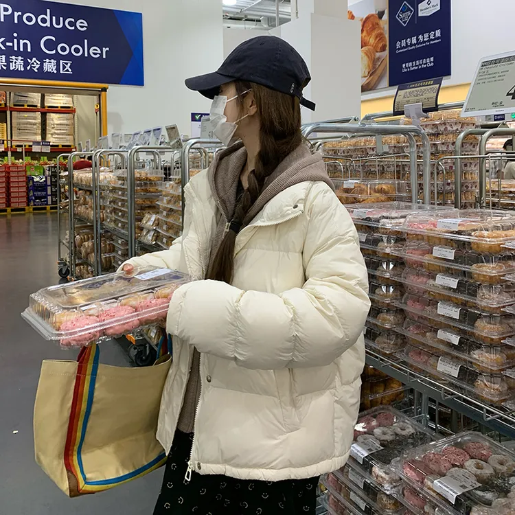 独特超好看色假两件拼接连帽羽绒服女冬2025新款加厚90白鸭绒外套