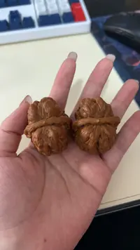 文玩盘完核桃手把件