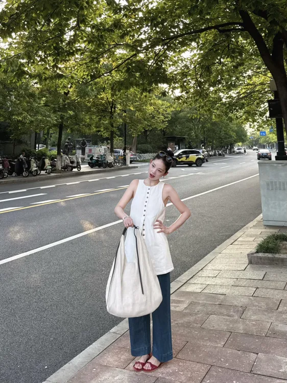 法式单排扣马甲背心气质无袖圆领收腰显瘦中长款女上衣百搭牛仔裤