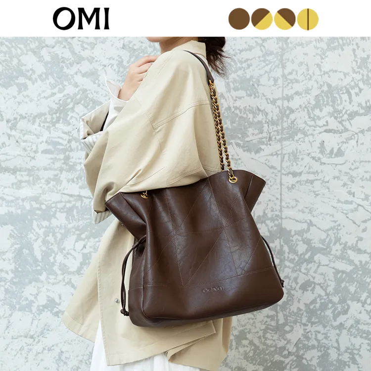 OMI/欧米新款植鞣牛皮黑色学院风拉链软面单肩款斜挎包小香风