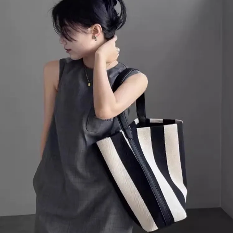 娜娜家~条纹帆布包水桶包女大容量小众包包2025新款单肩大包女包