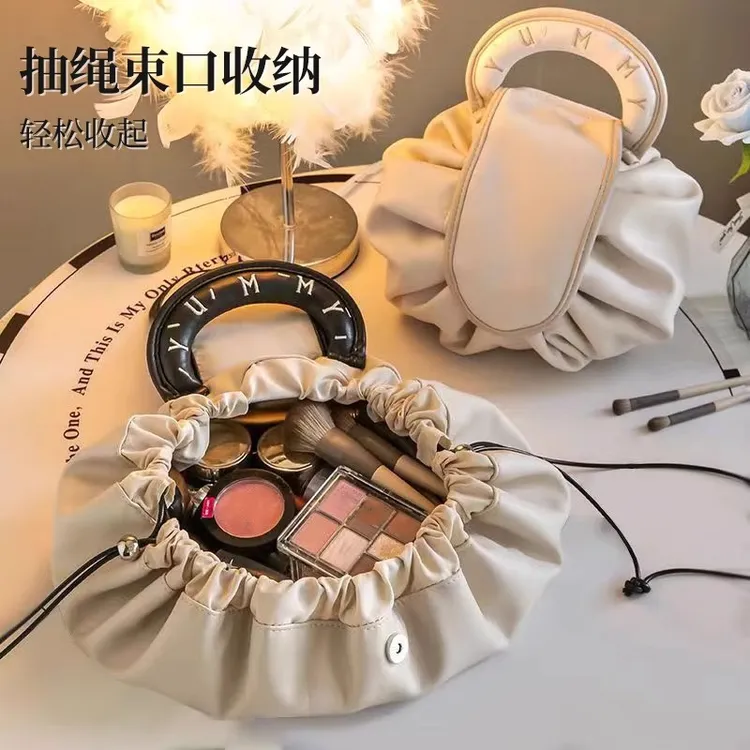 化妆包女大容量2024新款便携式懒人旅行收纳抽绳出差洗漱包一片式
