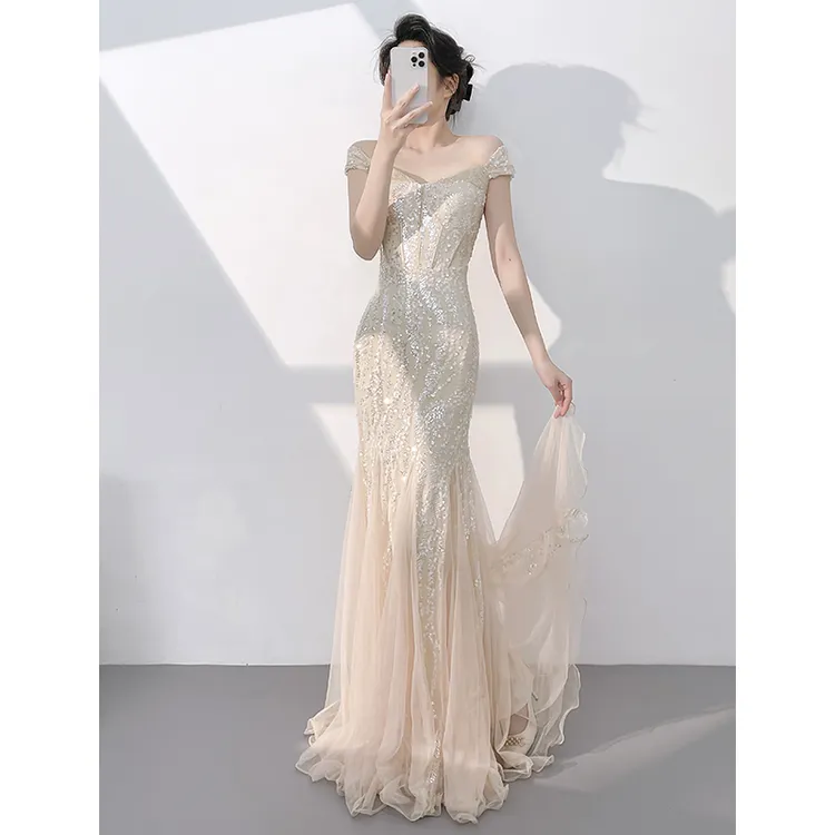 香槟色晚礼服女2025新款高级感气质绝美主持人一字肩鱼尾亮片长裙