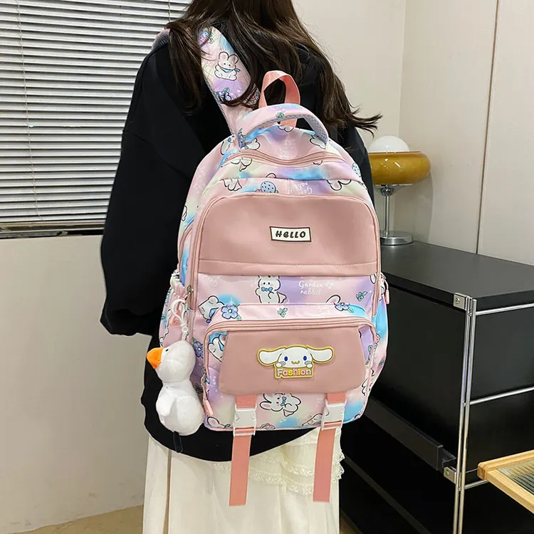 新款韩版卡通图案女生书包高中生可爱双肩包大容量洋气初中生背包