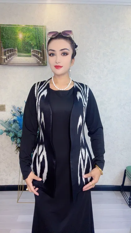 时尚白搭显瘦气质优雅高贵民族风艾特莱斯马夹(ئايرىم جىلىتكە )