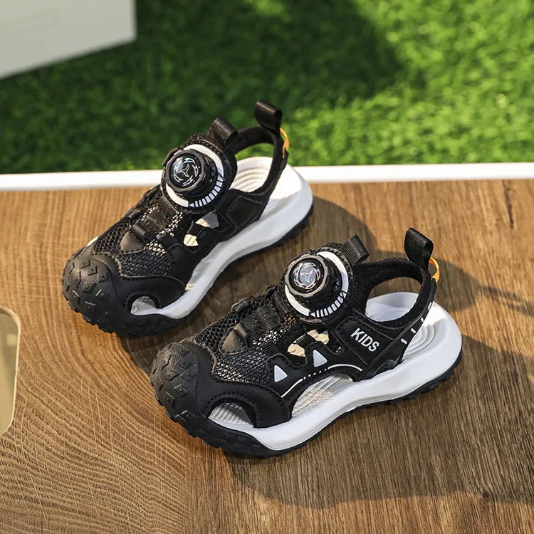 2025男女孩包头运动凉鞋新款夏季包头防滑旋转纽扣男孩休闲沙滩鞋