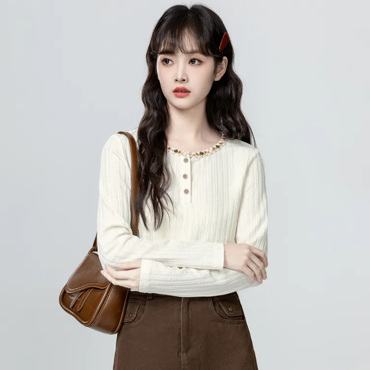 杏色圆领长袖针织衫女春秋2025秋季新款肌理感宽松内搭打底衫上衣