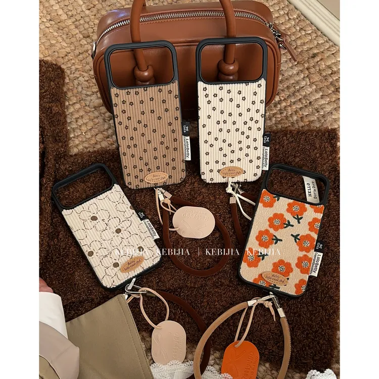 ins碎花花朵复古灯芯绒挂绳防摔适用于苹果17promax15/16手机壳