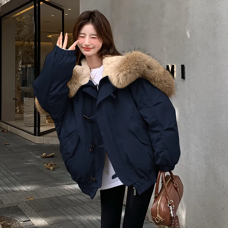 高级感气质大翻领羽绒服女2024冬季新款设计感牛角扣派克服外套