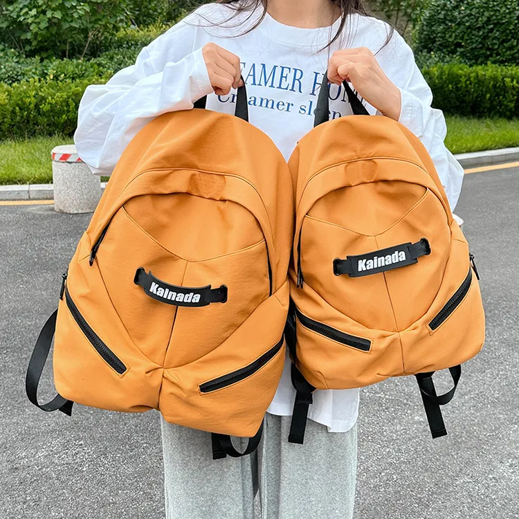 新款时尚休闲双肩包户外通勤背包百搭高中生大学生女书包