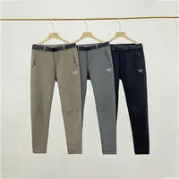 【清仓折扣】刺绣鸟家美式拉链防风防水冲锋裤户外休闲情侣运动长裤