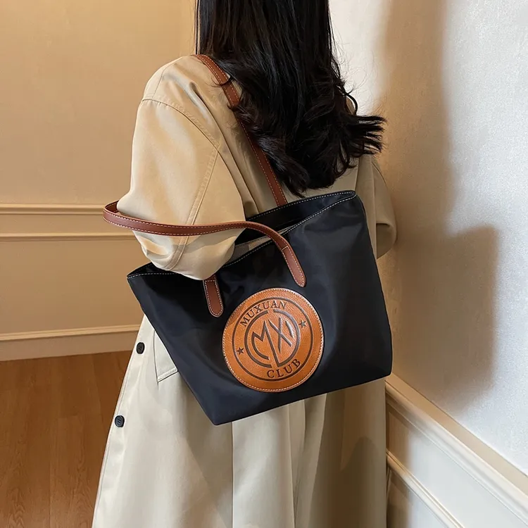 包包女新款时尚百搭轻便托特包大容量通勤单肩休闲女士简约包大包