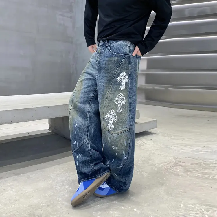 美式hiphop复古做旧拼接珍珠钢钉牛仔裤男款高品质宽松阔腿弯刀裤