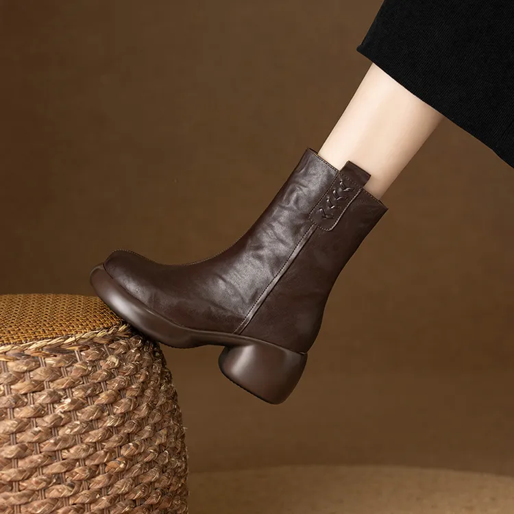 羊毛加厚中筒靴女纯色圆头冬季新款保暖马丁靴粗跟厚度复古女靴