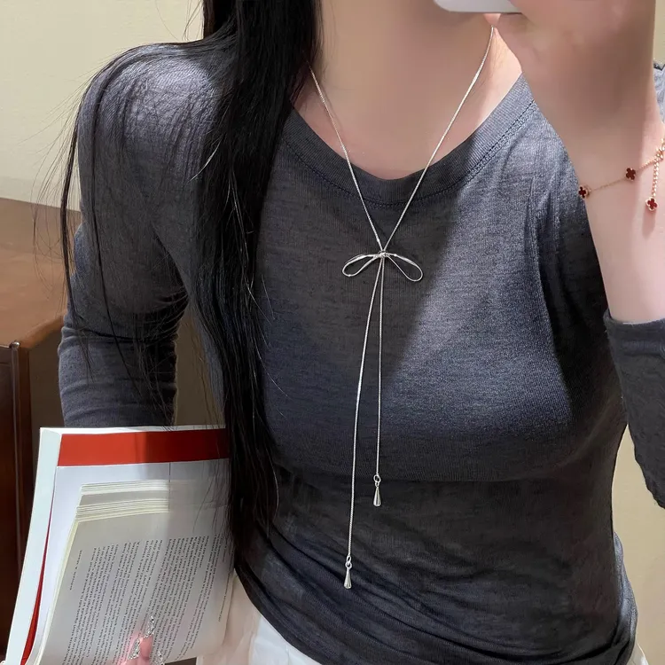 铜合金项链 银色蝴蝶结抽拉项链女温柔轻奢高级精致百搭气质坠链