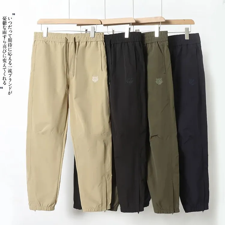 户外机能风速干防泼水刺绣虎头格纹男女休闲工装长裤直筒裤