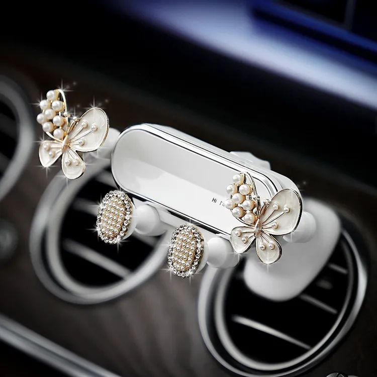 小蝴蝶汽车手机支架车载出风口导航支撑架多功能车内装饰用品大全