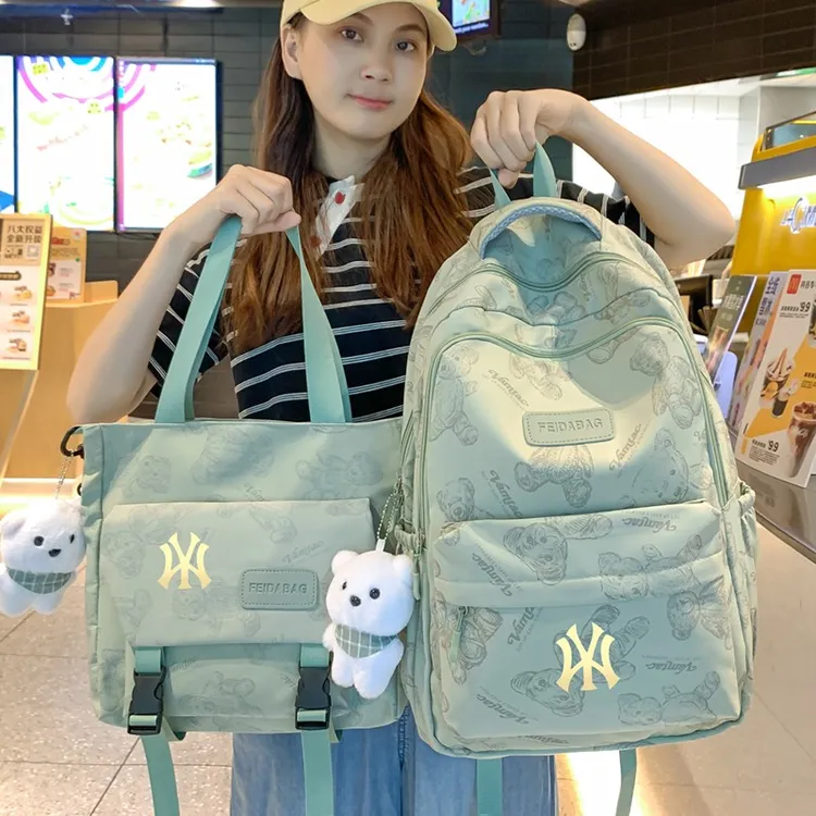 高端时尚潮牌双肩包男女夏季新款大学生书包电脑包休闲短途旅行包