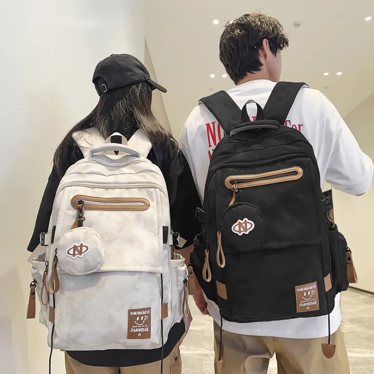 书包女初中生大容量减负护脊双肩包高中大学生小学生男生轻便背包