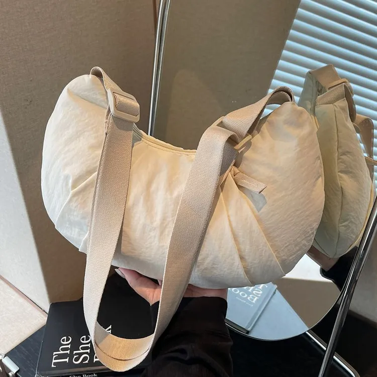 饺子包女包2025冬新款日系纯色简约上班通勤布包大容量单肩斜挎包