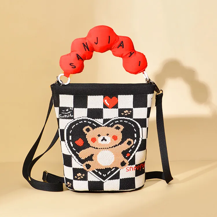 升级款立体感圆筒式棋盘格拉链手机工作包包手提单肩工作针织包女